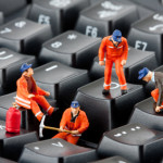 Workers repairing keyboard